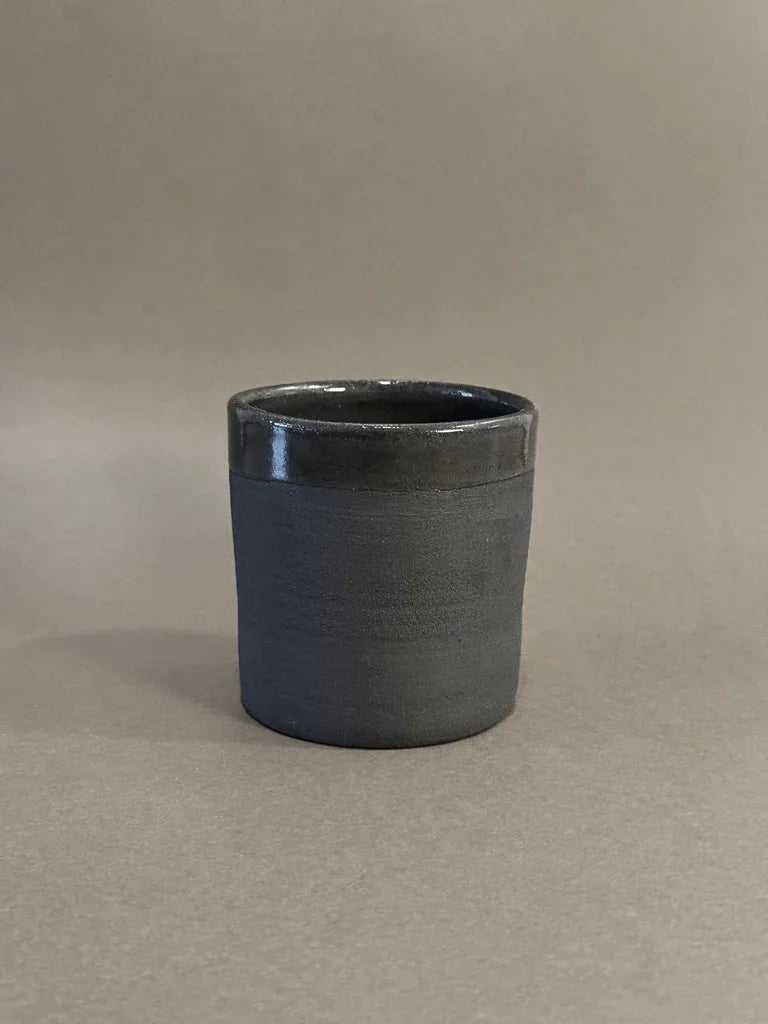 Black Earth Cup large ceramic cup with matte base and glossy rim on neutral background